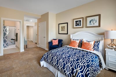 Cozy private resident room with a bed and shower
