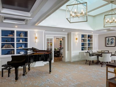 Interior common area with piano and seating