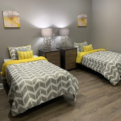 Cozy double room with two beds and decor