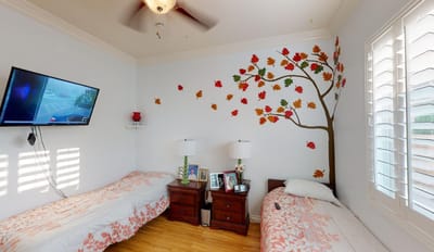 A cozy resident room with autumn decor