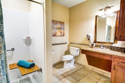 Interior bathroom with shower and sink amenities