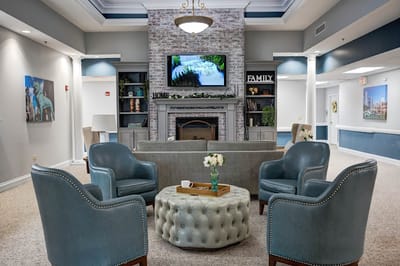 A comfortable living room area with seating and decor