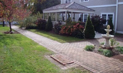 Well-maintained garden area with gazebo.
