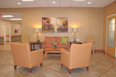 Cozy common area with seating and artwork