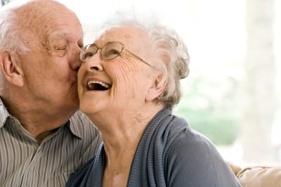 Elderly couple sharing a joyful moment
