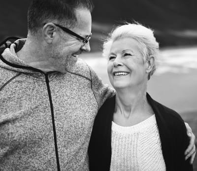 Happy elderly couple enjoying outdoor time