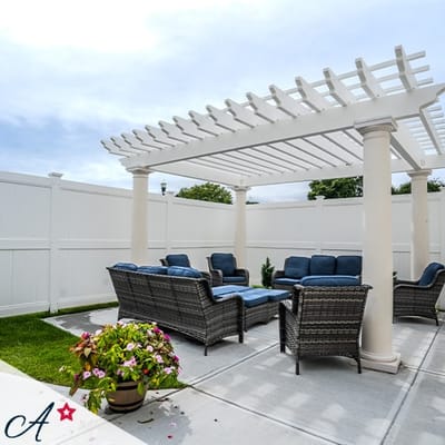 Outdoor lounge area with seating and plants