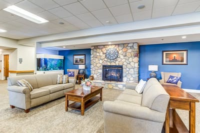 Cozy common area with comfortable seating and fireplace