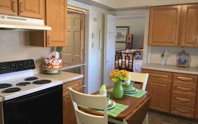 Cozy kitchen and dining area in a senior living apartment
