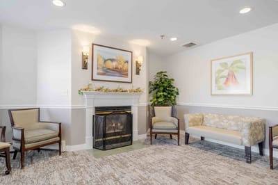 Cozy common area with comfortable seating and a fireplace