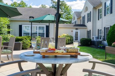 Outdoor dining area with a platter of food