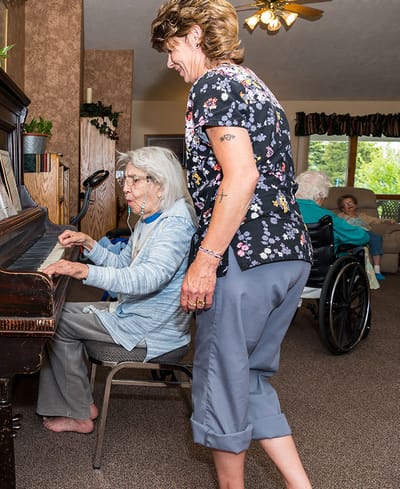 Residents engaging in music activity in a common area