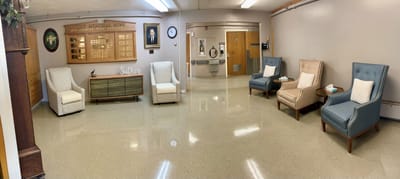 Interior of a cozy common area with seating.