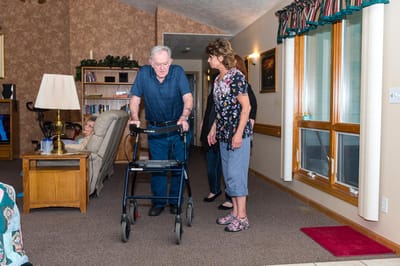 Residents and staff interacting in a common area