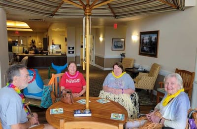 Residents enjoying a social gathering in a common area