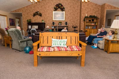 Residents socializing in a cozy common area