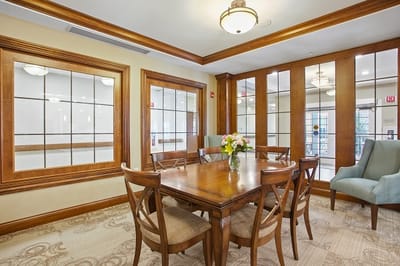 Bright interior of a common area with a dining table