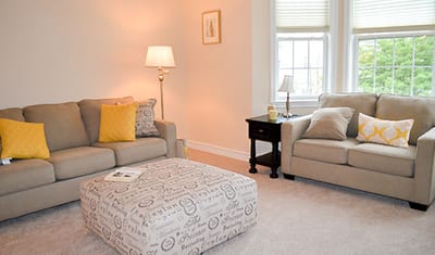 Cozy living room setup in a resident's suite