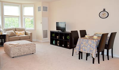 A cozy interior view of a resident room with furniture