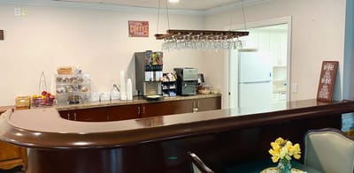 Interior view of a facility common area with refreshments