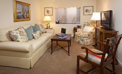Cozy common area with a couch and armchair