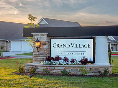Exterior view of Grand Village at Clear Creek sign