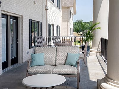 Outdoor seating area with chairs and table