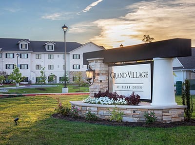 Exterior view of Grand Village at Clear Creek sign and building