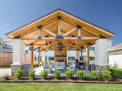 Outdoor gathering space with seating and landscaping