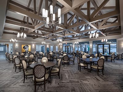 Spacious dining area with modern decor and lighting