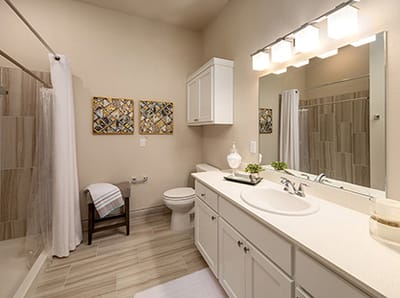 A well-furnished resident bathroom with modern fixtures