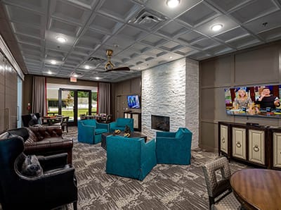 Comfortable common area with seating and TV