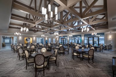 Dining area with tables and large windows