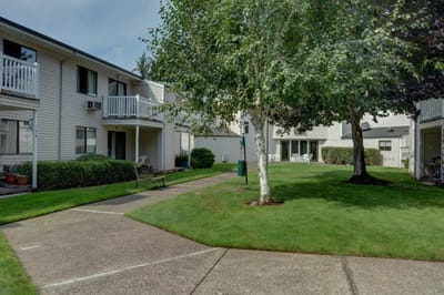 Well-maintained garden and walkway in a retirement community