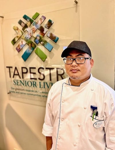 Chef in a common area of Tapestry Senior Living