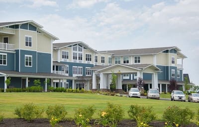 Exterior view of Traditions at Beaumont with gardens