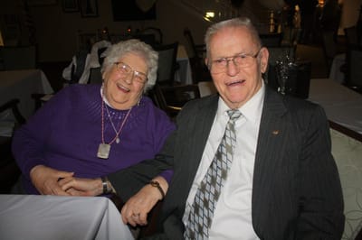 Two residents enjoying time together, smiling