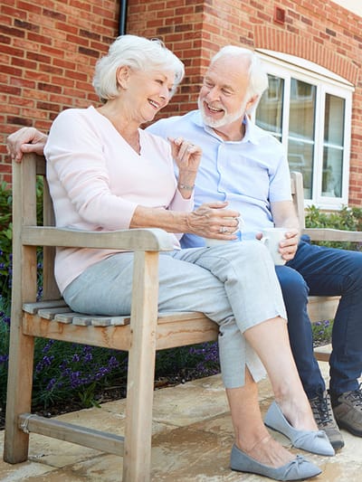 A couple enjoying time together in a garden