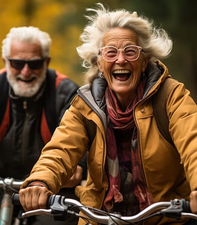 Seniors enjoying a bike ride outdoors