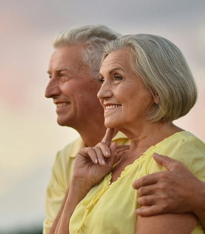 Happy senior couple outdoors enjoying a moment together