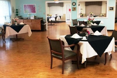 Dining area with decorated tables and chairs