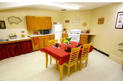 Bright dining area with wooden table and chairs