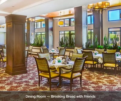 Elegant dining room with tables set for meals