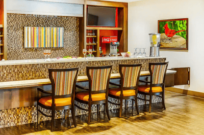 Interior view of a stylish bar area with seating