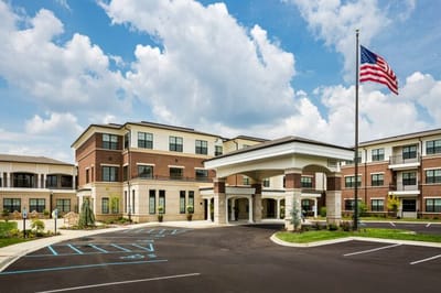 Exterior view of The Grand Senior Living facility