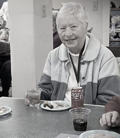Resident enjoying snacks at a dining area