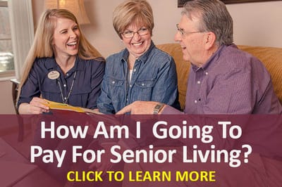 Residents discussing senior living options with staff