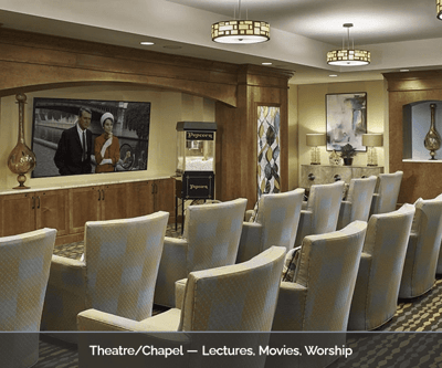 Interior view of a theater/chapel area with seating