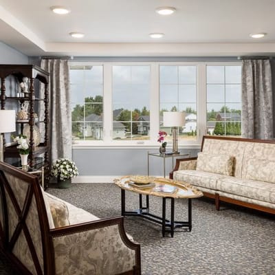 Bright common area with elegant seating and decor
