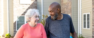 Two residents enjoying a moment outside